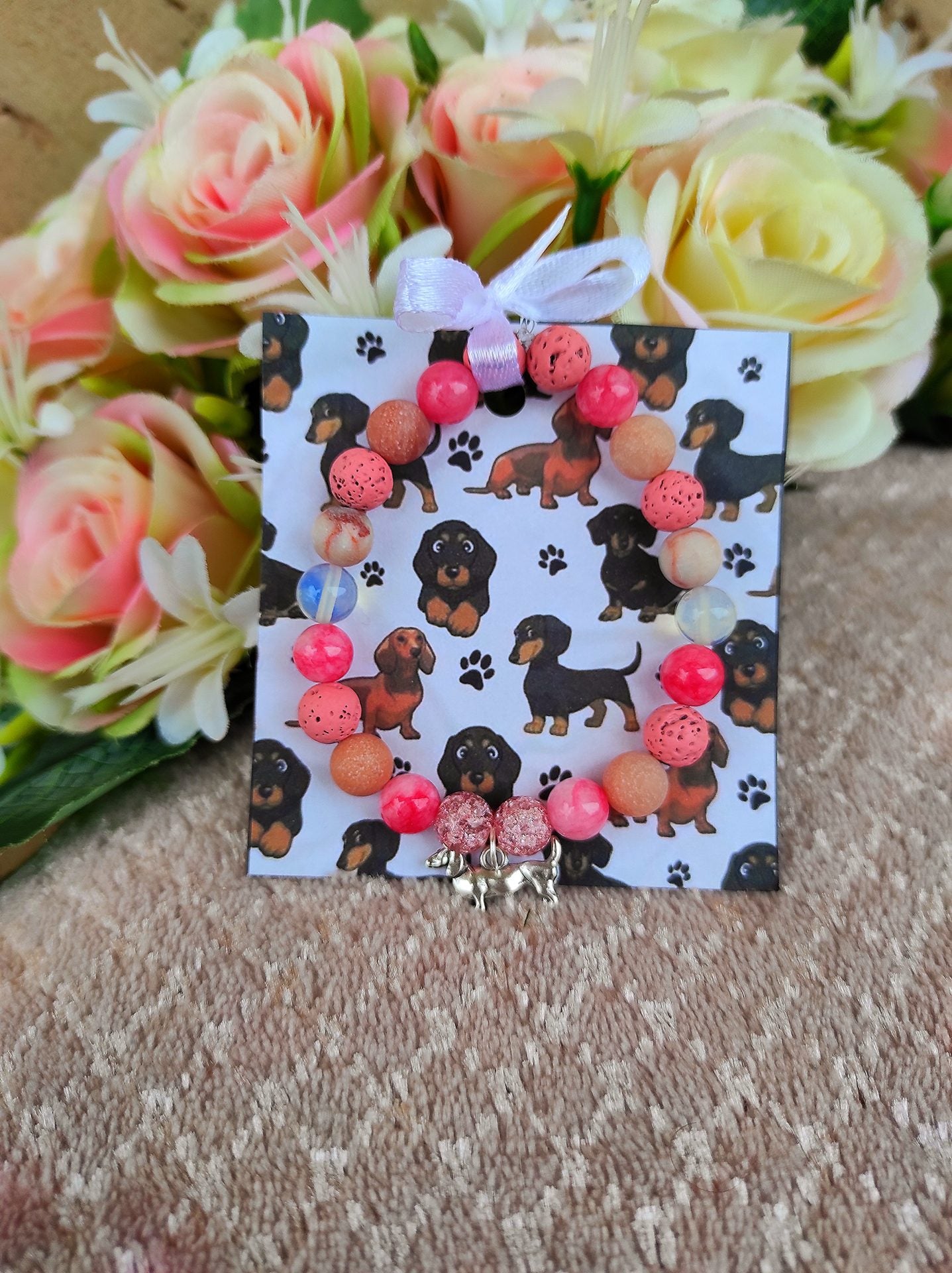 Tacskó kutyusos pink karkötő